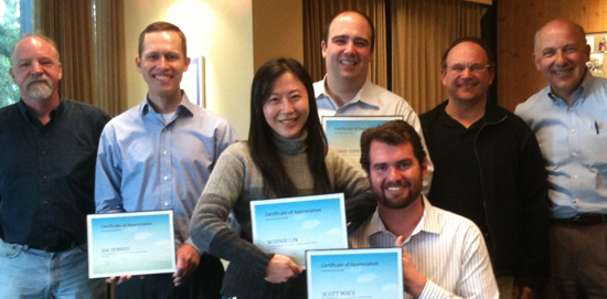 The MBA field study group assigned to Microsoft Cloud poses with their certificates.