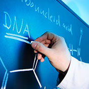 words DNA on a chalkboard