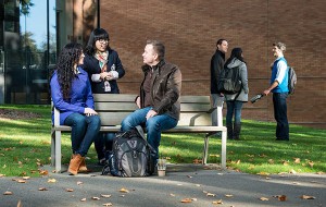 Students talking to each other outside of PACCAR Hall