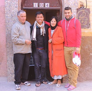 Vinh Trinh with his host family outside their home in Morocco