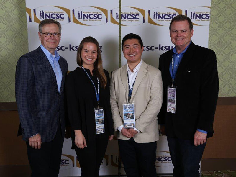 Abby Carlson and Scott Lee, with coaches Rick Carter and Jeff Lehman at the National Collegiate Sales Competition