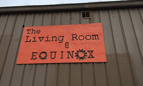 The Living Room @ Equinox Studios sign