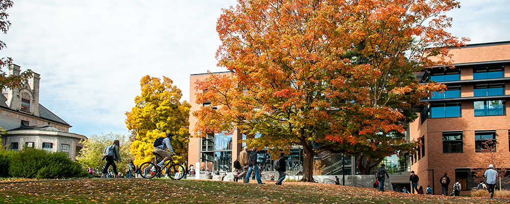 Students walking by PACCAR hall on campus