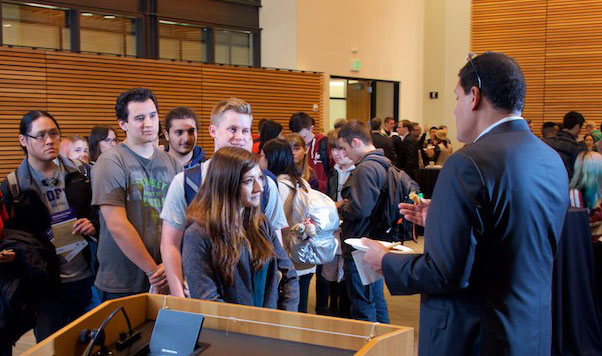 Reggie Fils-Aimé, President and COO of Nintendo of America, takes time to talk to Foster students