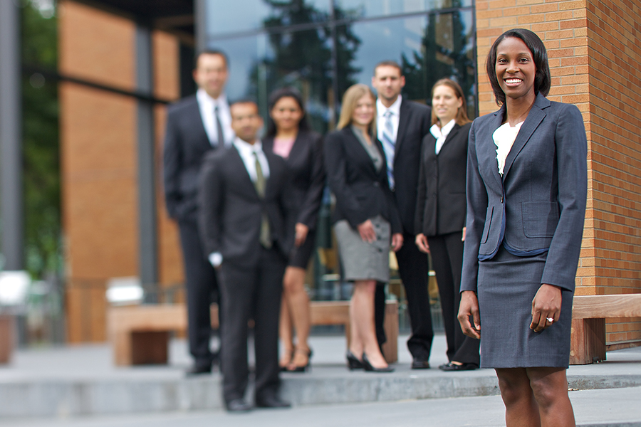 Foster Full-time MBA students in business attire