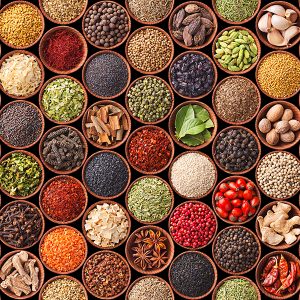 Colorful, assorted spices and herbs in bowls