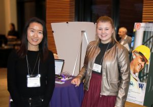 Science and Technology Showcase Second Place Prize and Best Marketing Strategy winner. OTOGEAR CEO Madeline Bennett (Right), shares a photo with student volunteer Diana Zhang (Left)