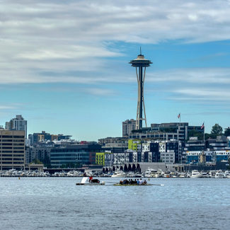 skyline of seattle showing space needle and water