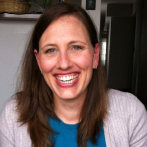 Headshot of Lauren Woodside Alegre smiling