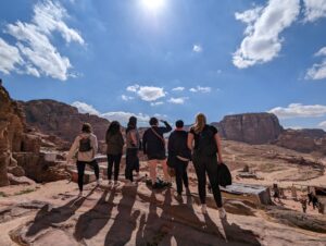 Six women look out over Petra, Jordan