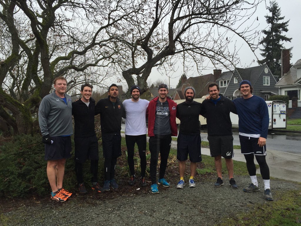 Candidates for the Rainier climbing team training in the rain at Green Lake