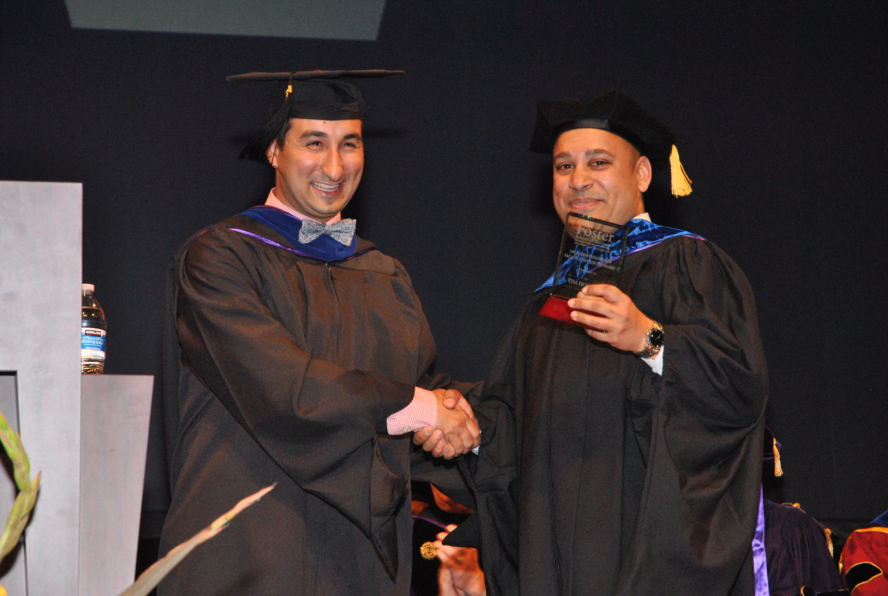 Tim Hossain, Evening MBA Director of Student Affairs, accepts his Service Award.