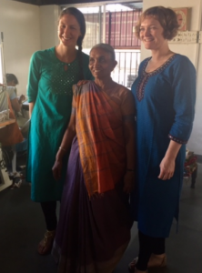 Lacey and her teammate Elizabeth Adams with the CEO of SEWA, Savitabel Patel