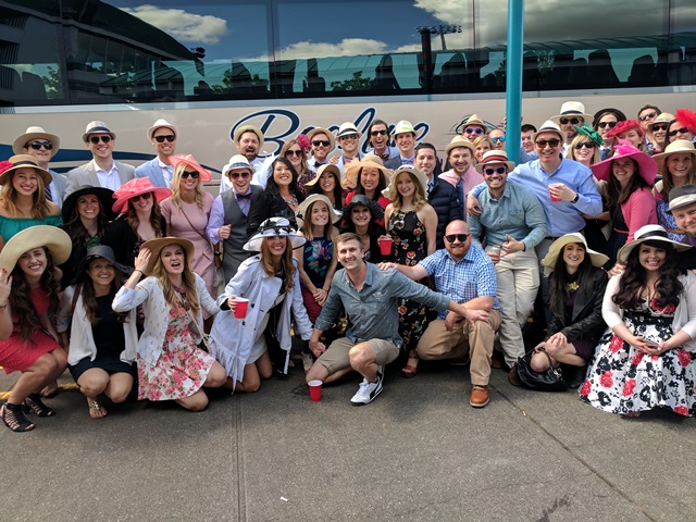 Stacy organized annual Derby trip for classmates, bringing everyone together for an excuse to wear fancy hats and have a good time with friends