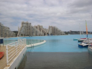 Riding in a boat on the world's largest swimming pool (Crystal Lagoons)